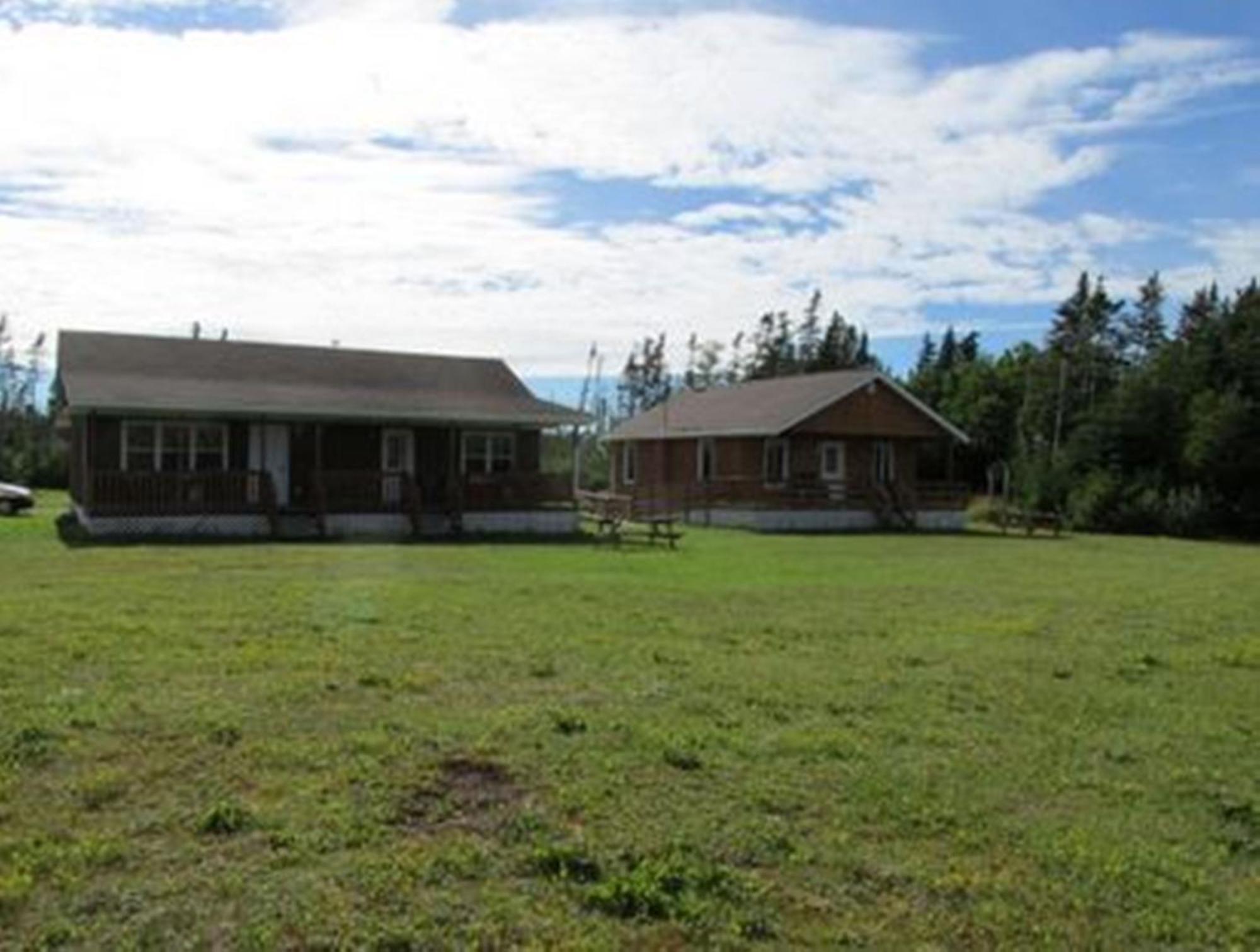 Riverside Chalets River of Ponds Exterior photo